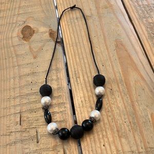 Hand crafted black and white necklace.